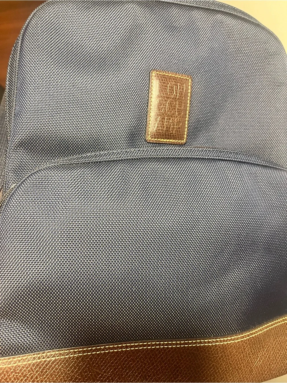 Longchamp Men's Navy Blue Backpack with Brown Trim